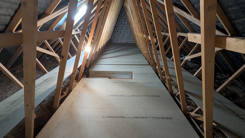 Boarded loft floor through trussed roof, central walkway, Solihull