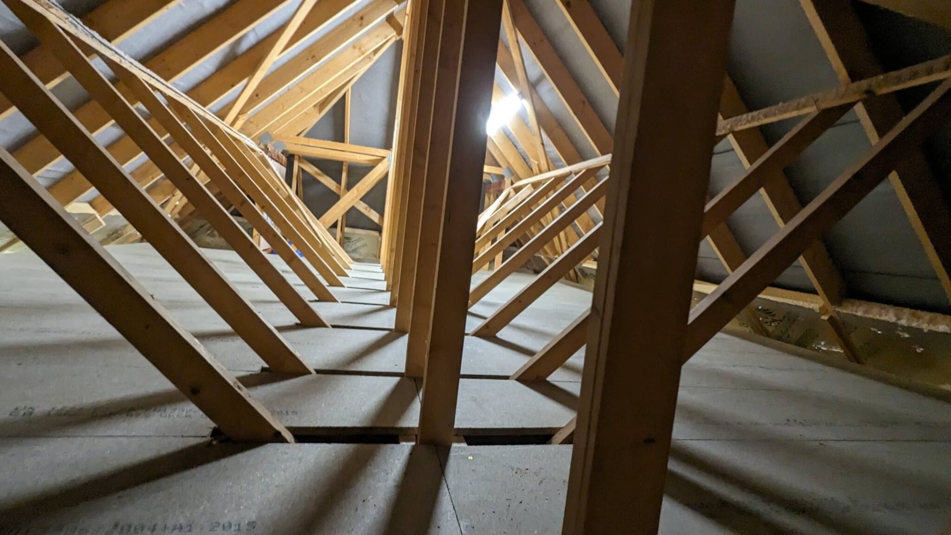 Bare loft trusses prior to clearance and boarding works