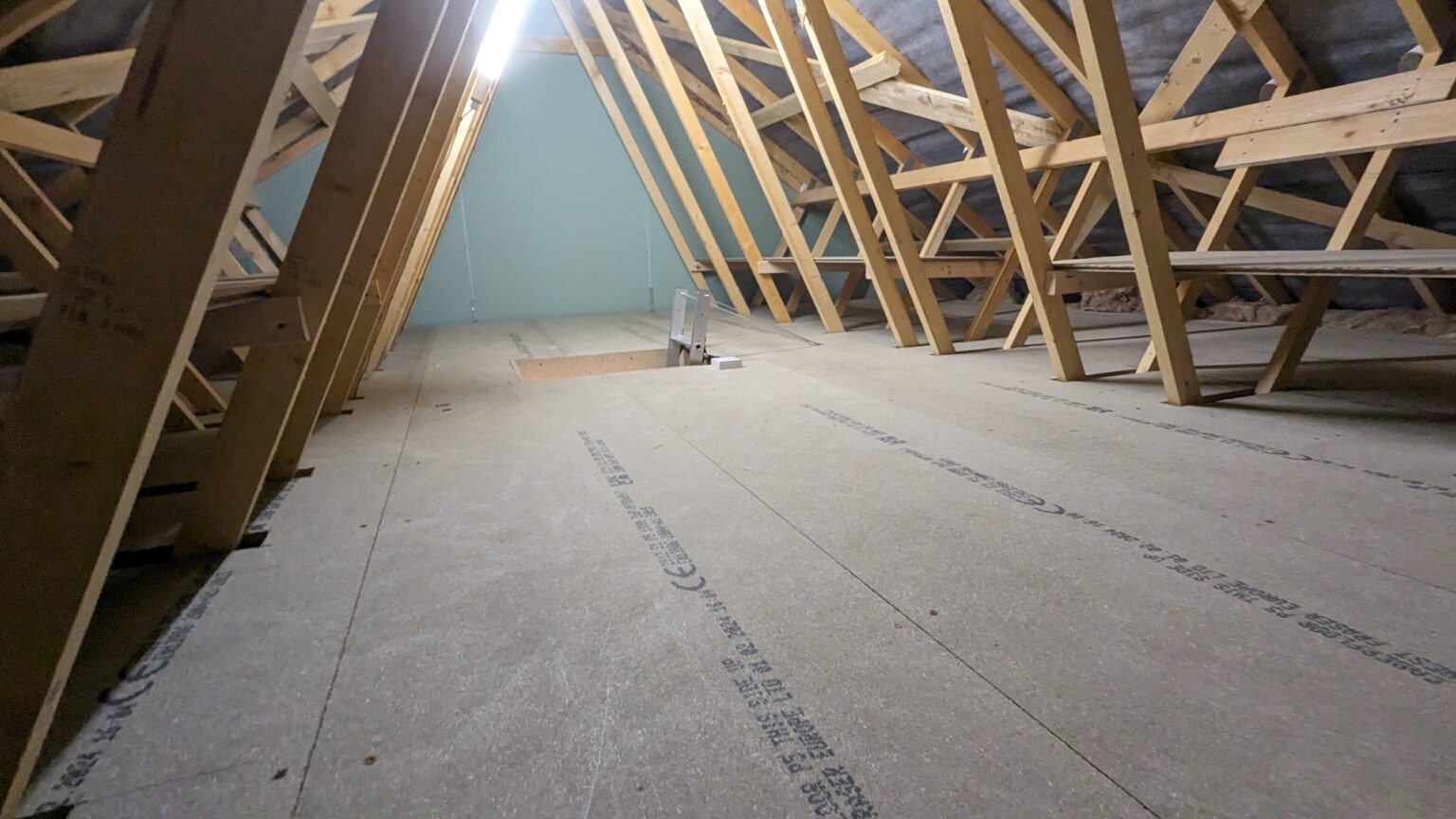 Wide boarded loft storage floor between trusses, Loft Kings install