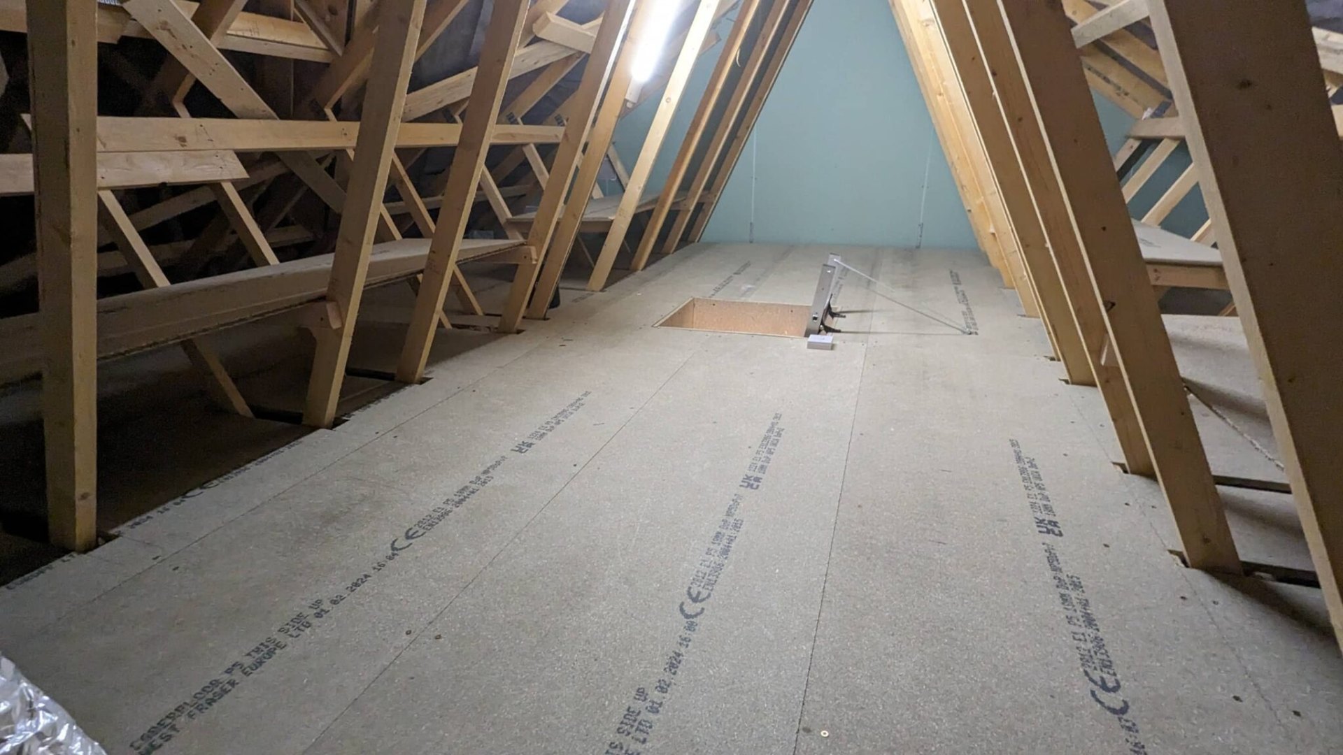 LED strip lighting across boarded loft for safe access