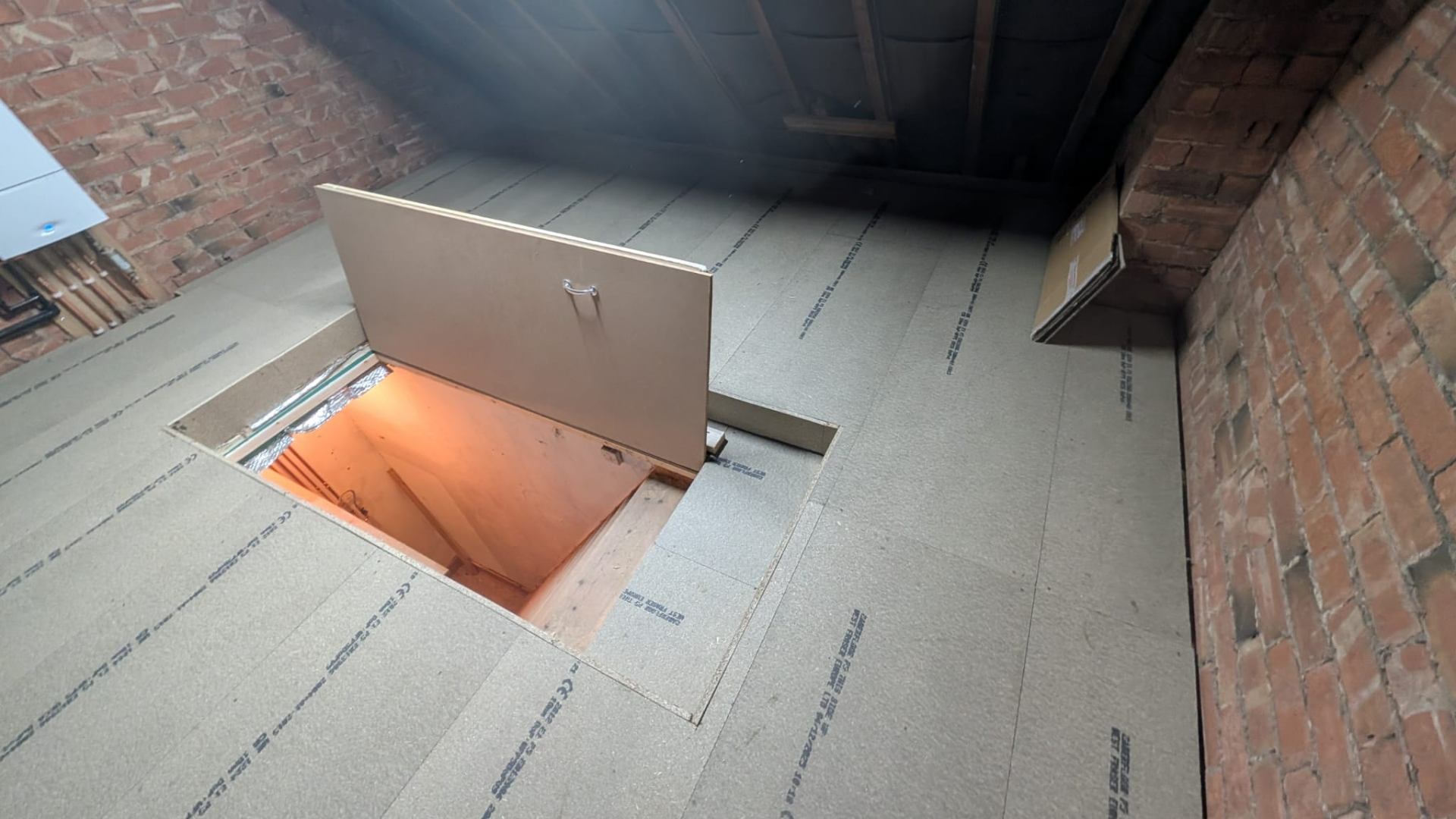 Section of finished loft boarding with structural bracing visible