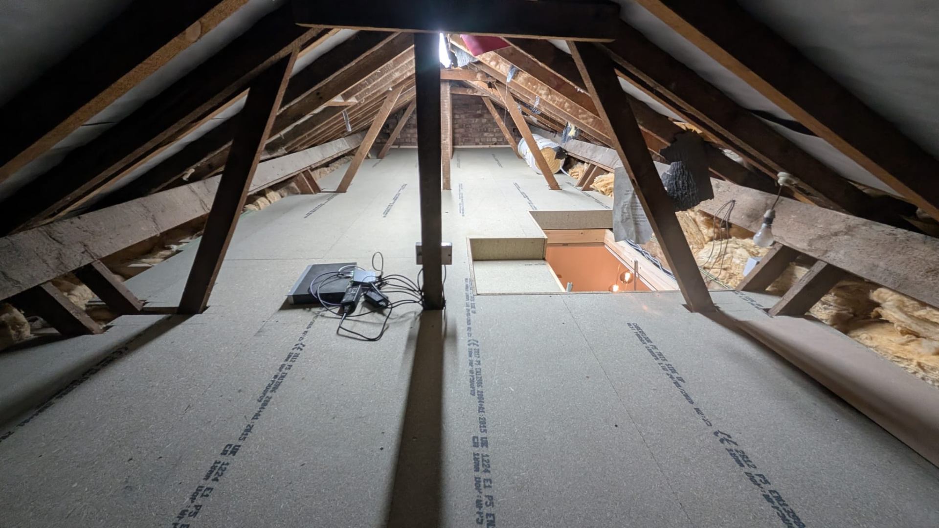 P5 moisture-resistant chipboard loft boards laid over joists