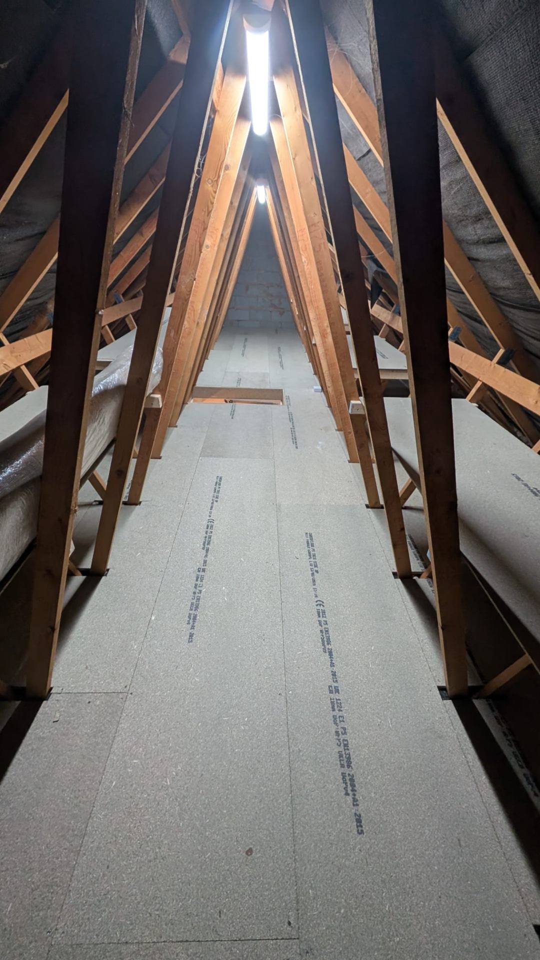 Loft boarding job completed across new-build trusses