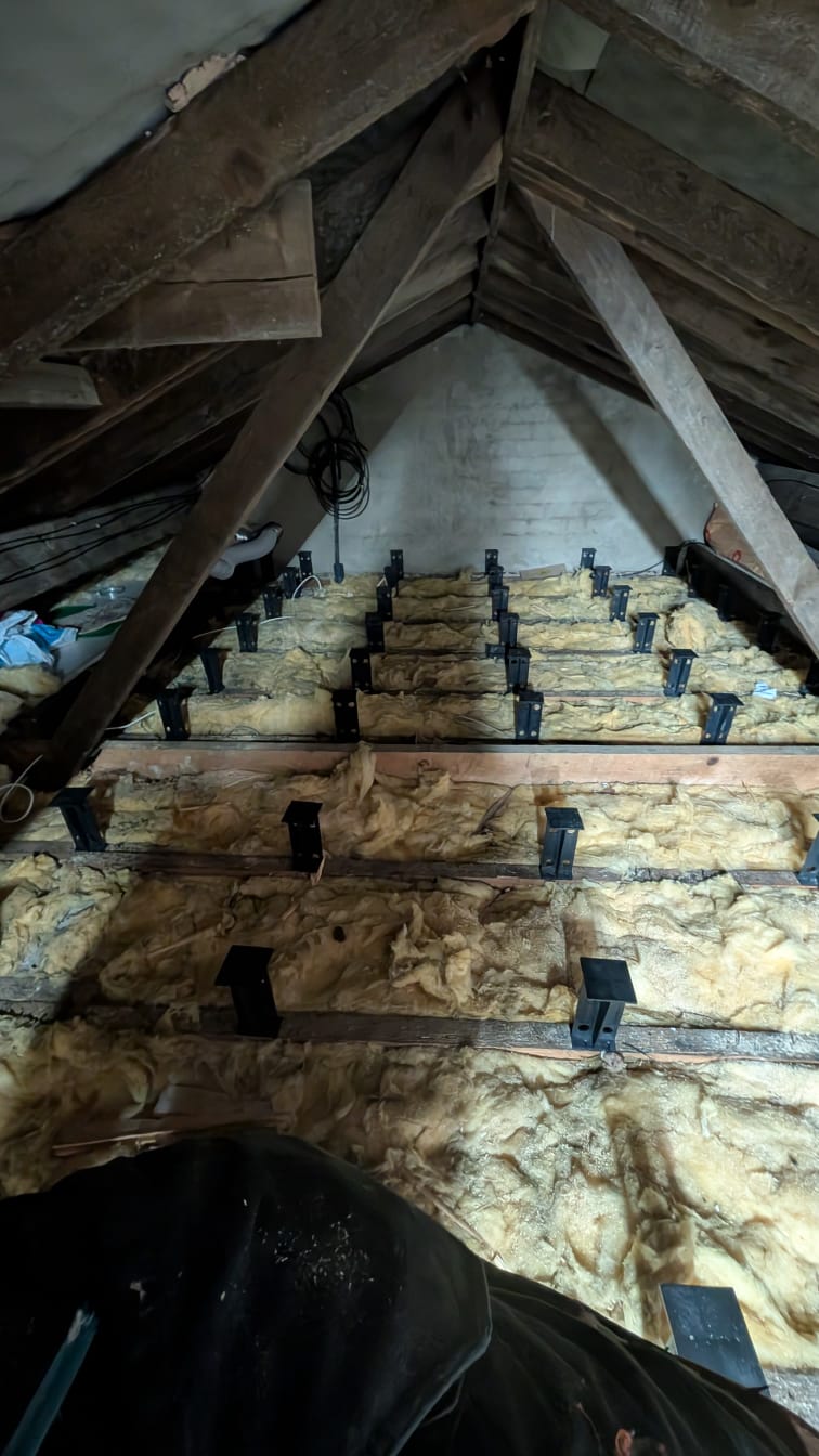Boarded loft floor across full attic span